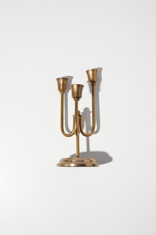 Golden triple candle holder