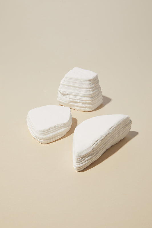 White layered stone blocks